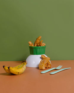 Close-up of bread in plate on table