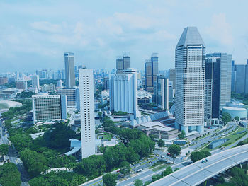 High angle view of buildings in city against sky