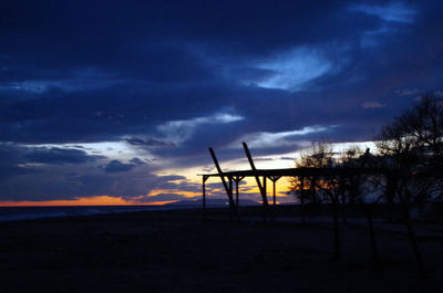 Scenic view of landscape against cloudy sky