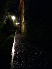 Illuminated road at night