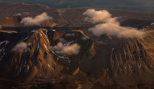 Smoke emitting from volcanic mountain