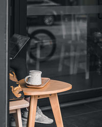 Coffee cup on table in cafe
