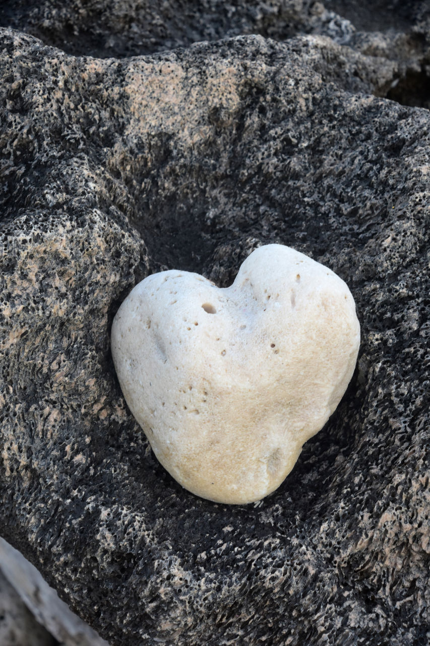 heart shape, love, positive emotion, emotion, high angle view, no people, rock, valentine's day, heart, nature, close-up, food, day, food and drink, still life, land, outdoors, shape, directly above, creativity, textured