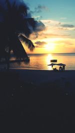 Scenic view of sea at sunset