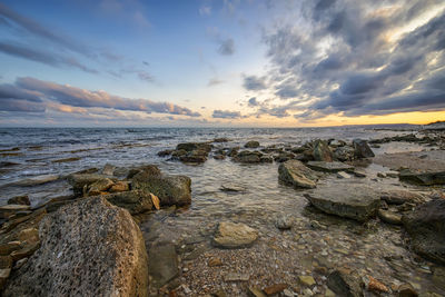 Scenic view of sea against sky during sunset