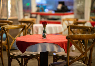 Empty chairs and table in restaurant