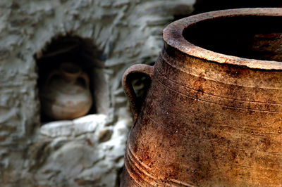 Close-up of rusty abandoned metallic container