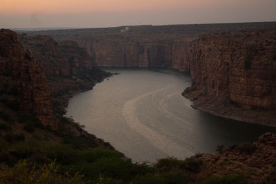 Scenic view of landscape against sky during sunset