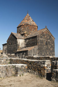 View of old building against blue sky
