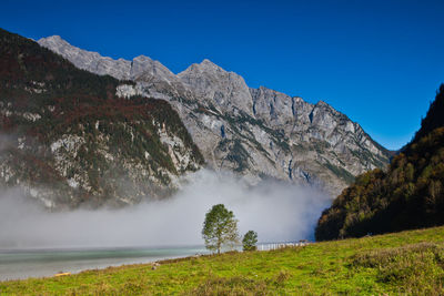 Scenic view of mountains against clear sky