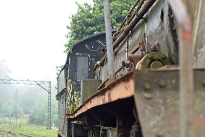 Close-up of train against sky