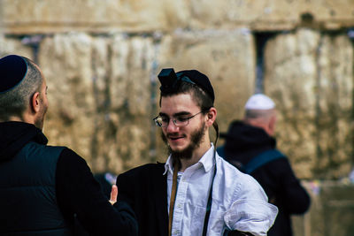 Portrait of young man outdoors