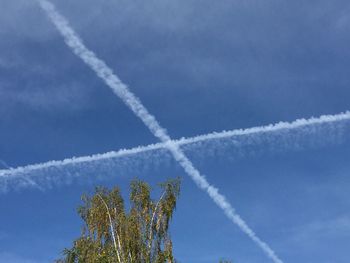 Low angle view of vapor trail in sky