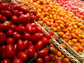 High angle view of tomatoes for sale at market stall