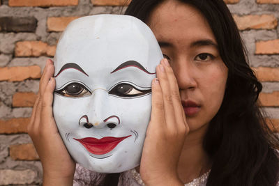 Close-up of woman wearing mask