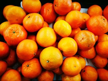 Full frame shot of oranges in market