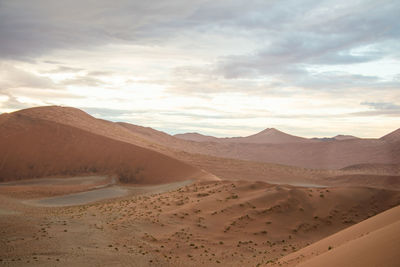 Scenic view of desert against sky