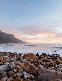 Scenic view of sea against sky during sunset