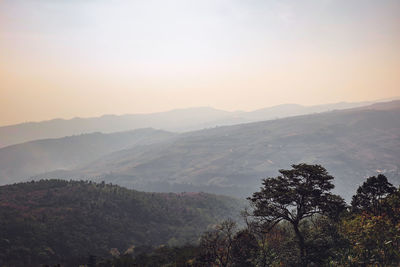 Scenic view of mountains against sky during sunset