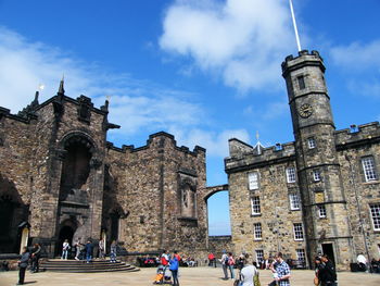 Group of people in front of historical building