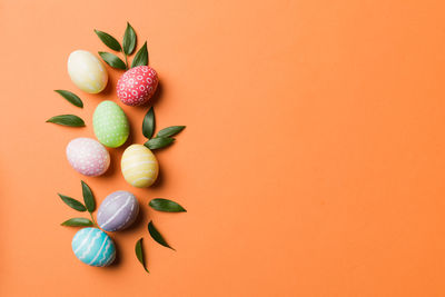 Directly above shot of strawberries against yellow background