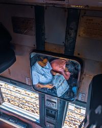 High angle portrait of man relaxing on floor