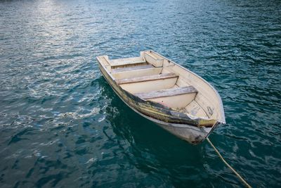 Boat moored in calm lake