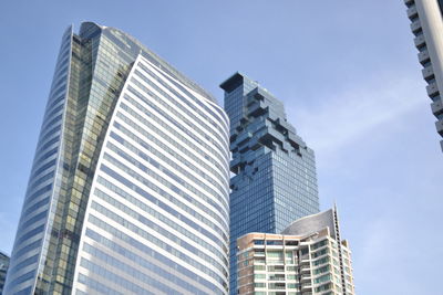 Low angle view of modern buildings against sky