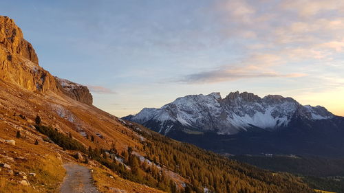 Scenic view of mountains against sky during sunset