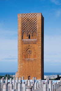 View of bell tower against sea