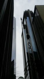 Low angle view of skyscrapers against sky