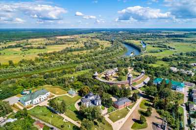 High angle view of trees on field against sky