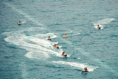 High angle view of people in sea