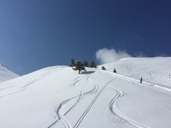 Snow covered mountain against sky