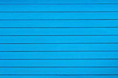 Full frame shot of blue wooden plank