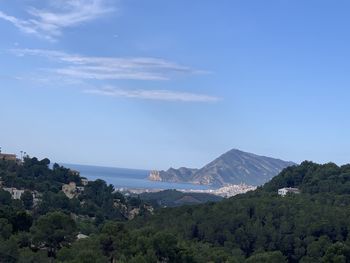 Scenic view of landscape and mountains against sky