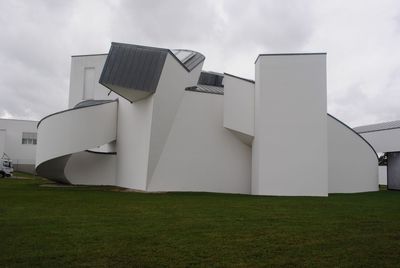 Low angle view of built structure on grassy field