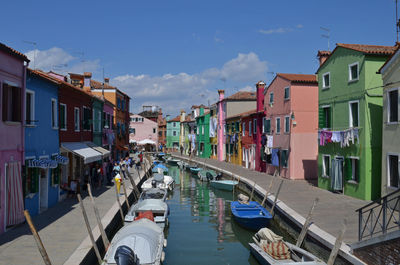 Boats moored in canal