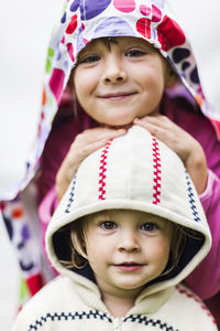 Portrait of smiling girls, studio shot