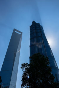 Low angle view of modern buildings against sky