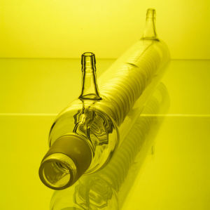 Spiral condenser on yellow background