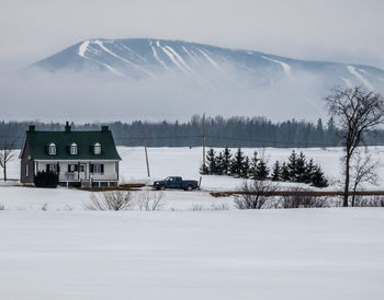 Early spring landscape on ile dorléans. view on mont-sainte-anne.