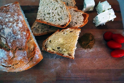 High angle view of bread on cutting board