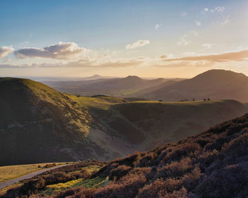 Scenic view of landscape against sky during sunset sunrise