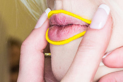 Close-up of woman holding ice cream