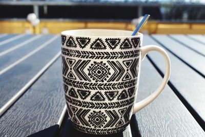 Close-up of coffee cup on table