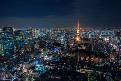 High angle view of illuminated city buildings at night