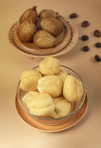 High angle view of fruits in basket on table