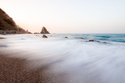 Scenic view of sea against clear sky