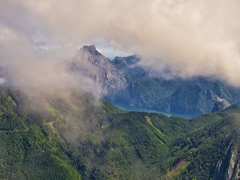 Scenic view of volcanic mountains against sky